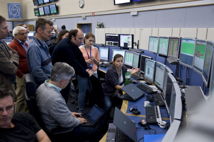 CERN physicists watch the injection of protons and ions into the LHC machine. (Photo: © 2009 CERN)