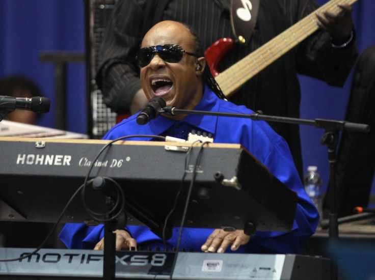Stevie Wonder sings during an election campaign rally for U.S. President Barack Obama in Cincinnati