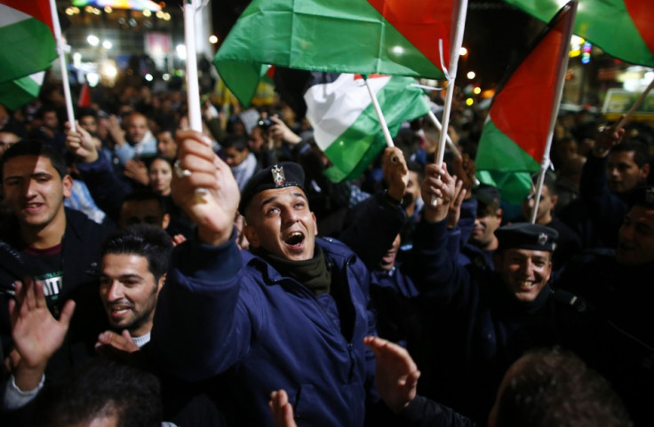 A Palestinian man shouts slogans during a rally in the West Bank city of Ramallah