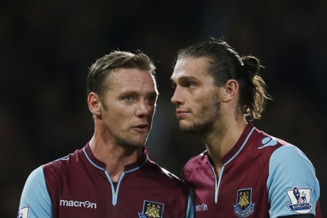 Kevin Nolan and Andy Carroll (R)