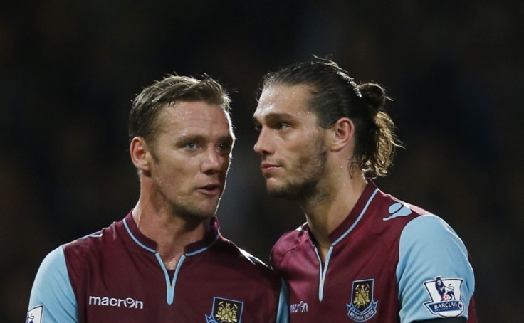Kevin Nolan and Andy Carroll (R)
