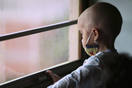 Sequera looks out the window while receiving chemotherapy treatment at a paediatric hospital in Maracaibo