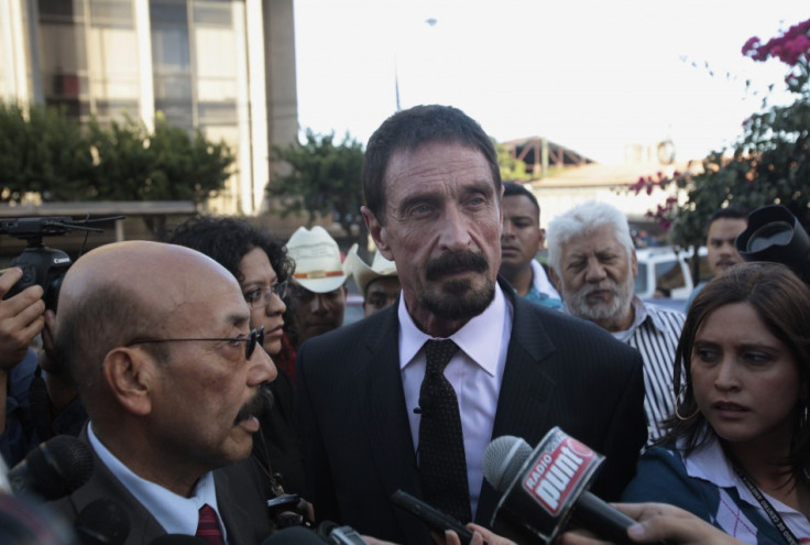 John McAfee attends a news conference with his lawyer Telesforo Guerra outside of the Supreme Court of Justice in Guatemala City