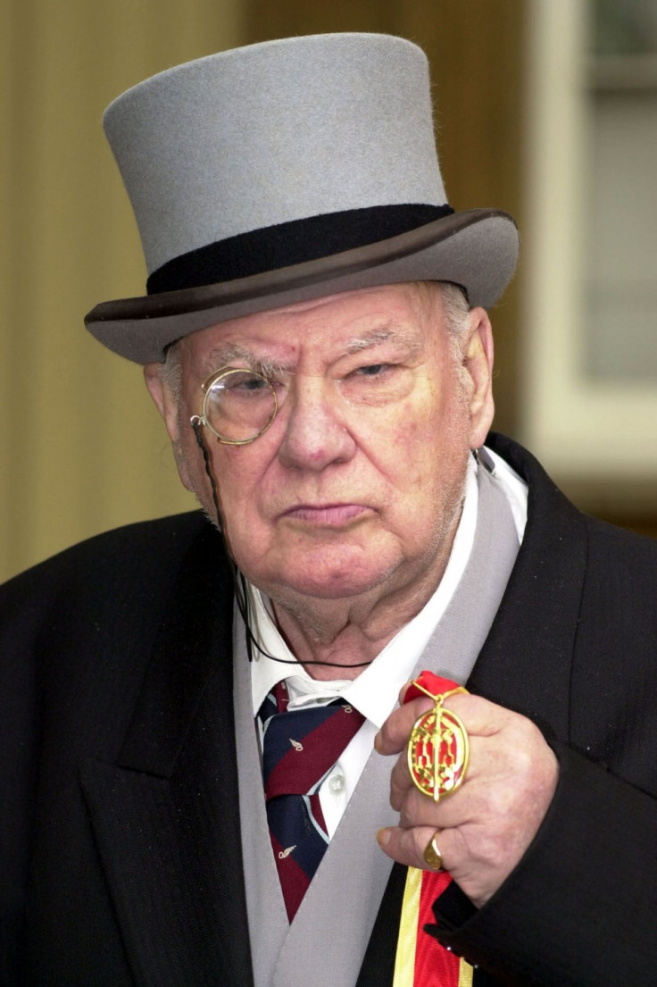 Astronomer Sir Patrick Moore with his knighthood that he received from The Prince of Wales at Buckingham Palace in London March 2, 2001 (Photo: Reuters)