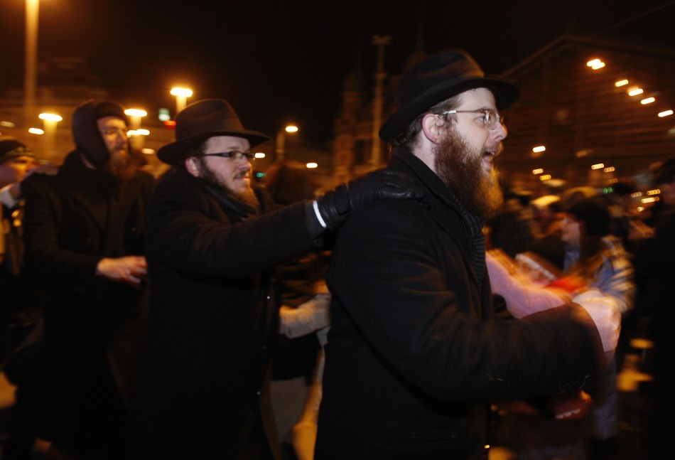 Members of Hungarys Jewish community gather to celebrate Hanukkah and to light the first candle on the menorah in downtown Budapest