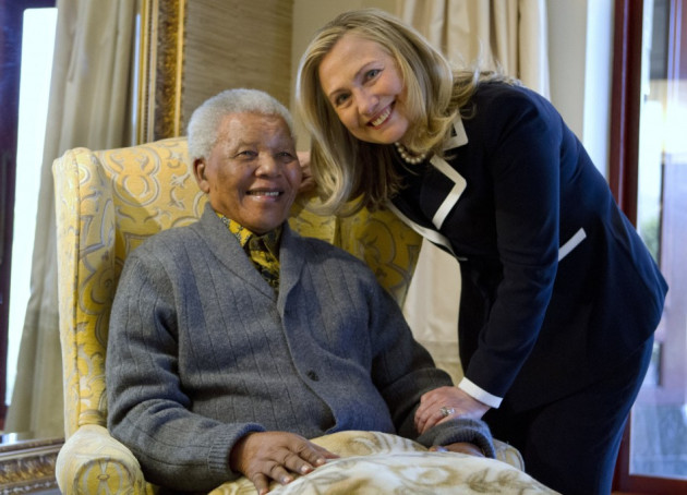 U.S. Secretary of State Hillary Rodham Clinton poses for a photograph with Nelson Mandela, U.S. Secretary of State Hillary Rodham Clinton poses for a photograph with Nelson Mandela,