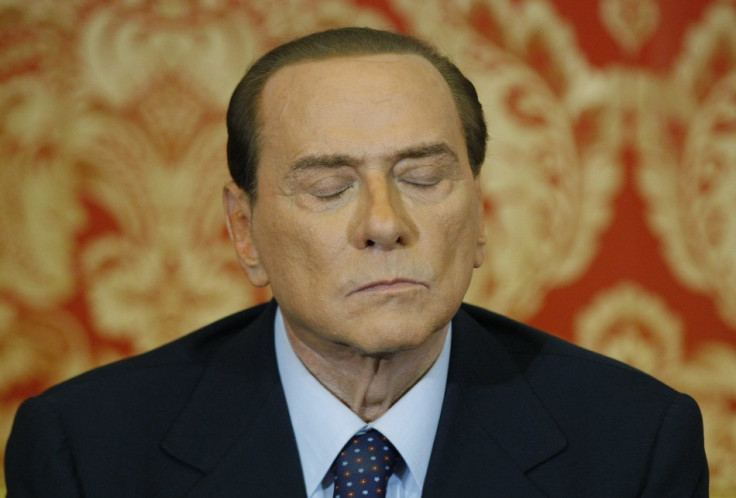 Italy's former Prime Minister Silvio Berlusconi listens during a news conference at Villa Gernetto in Gerno near Milan