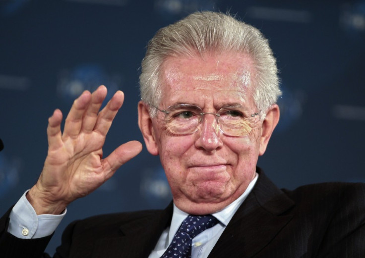Italy's Prime Minister Monti gestures at the World Policy Conference in Cannes