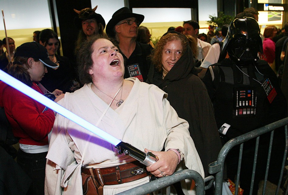 Wendy Wright yells while waiting in line for premiere of the new Star Wars movie in New York.