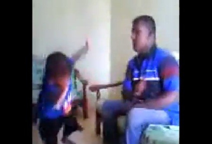 Man beating toddler