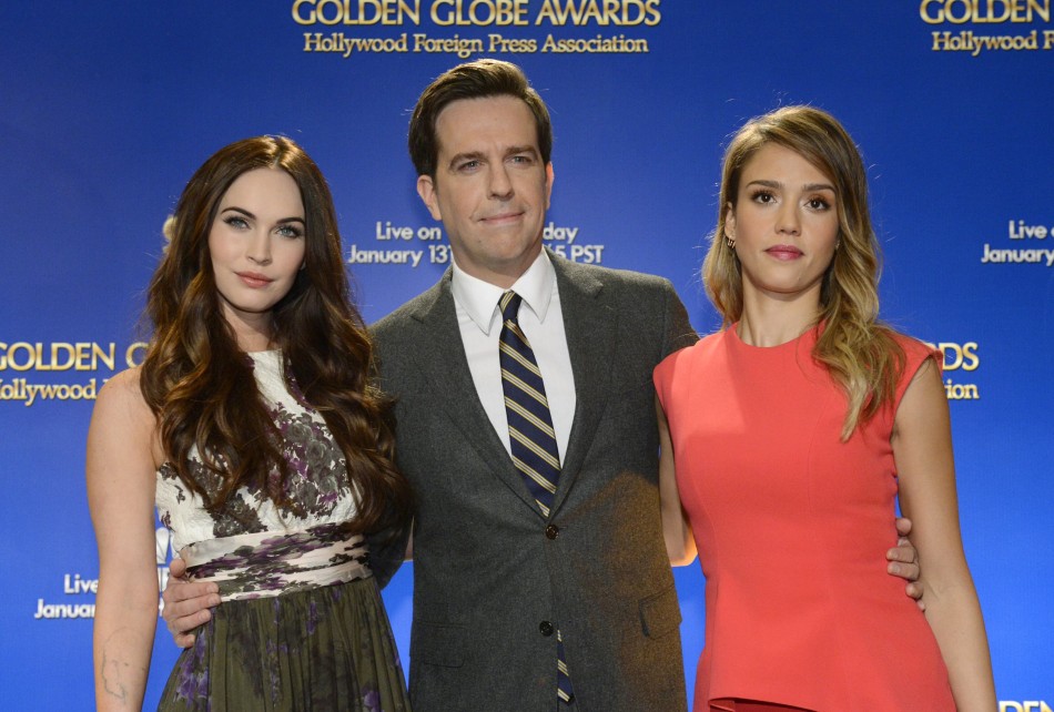 Actresses Fox and Alba pose for photographers with actor Helms at the announcement of nominations for the 70th annual Golden Globe Awards in Beverly Hills