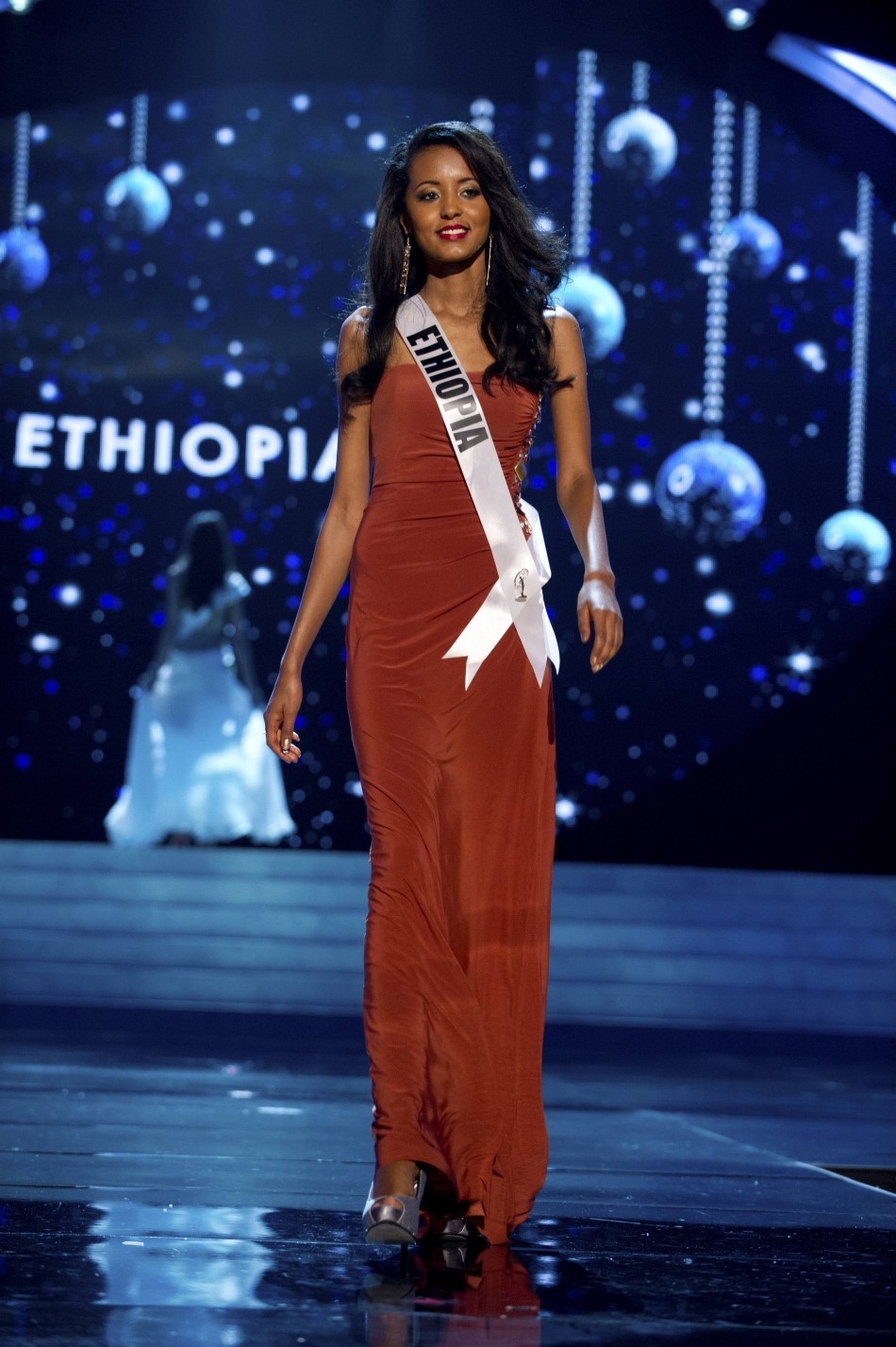 Miss Ethiopia 2012 Getachew competes in an evening gown of her choice during the Evening Gown Competition of the 2012 Miss Universe Presentation Show in Las Vegas