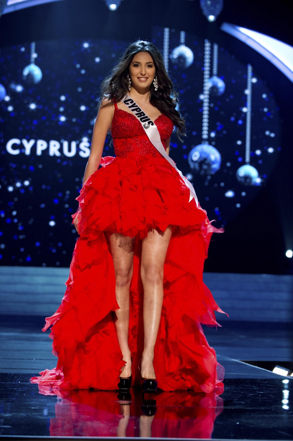 Miss Cyprus 2012 Yiannakou competes in an evening gown of her choice during the Evening Gown Competition of the 2012 Miss Universe Presentation Show in Las Vegas