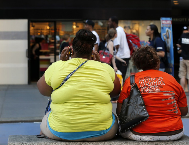 Women sit on bench in New York