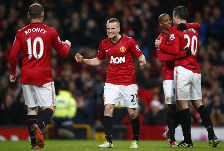 Wayne Rooney and Tom Cleverley (R)