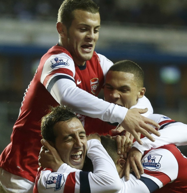 Cazorla celebrating his hat-trick with Wilshere, Gibbs and Podolski