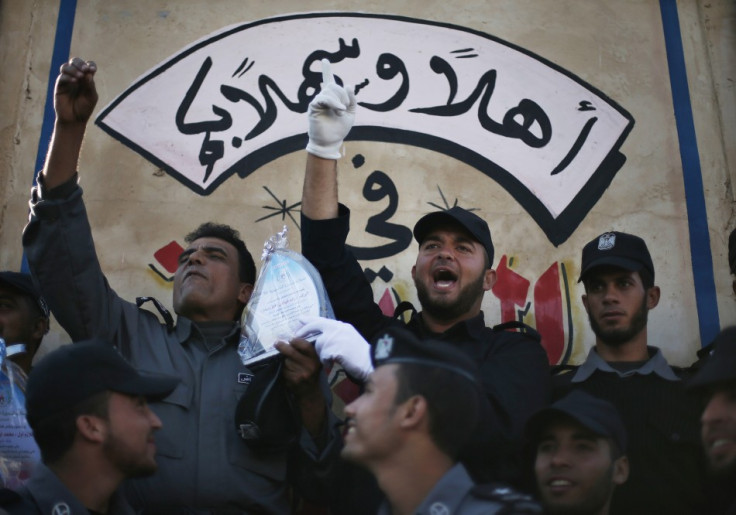 Members of Hamas police celebrate during a graduation ceremony in Gaza City