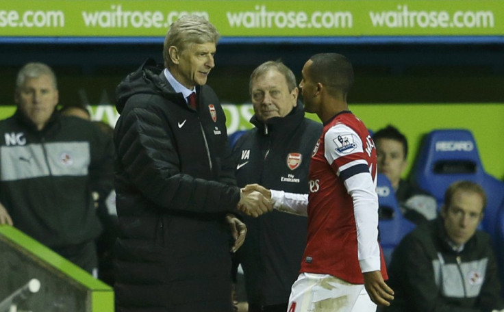 Arsene Wenger (L) and Theo Walcott