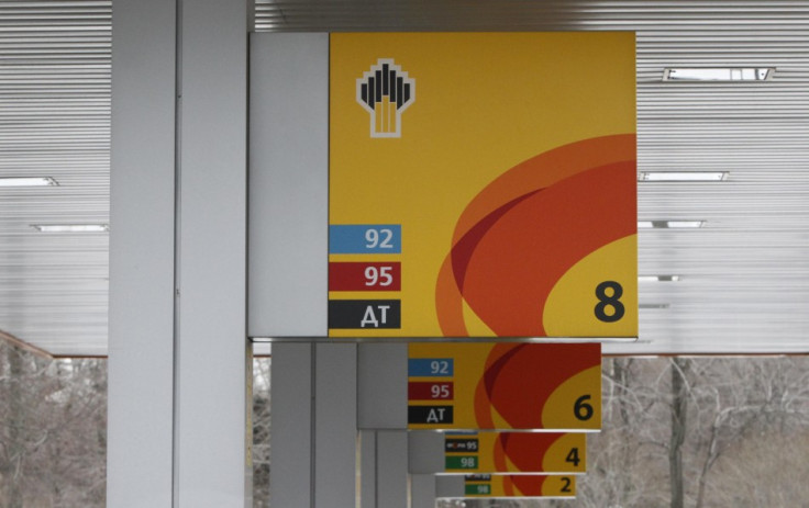 Company signage is seen on petrol pumps at a Rosneft filling station