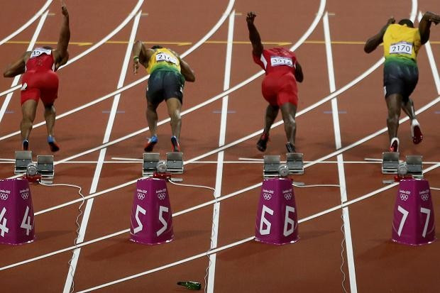 The bottle was thrown just before the start of the 100m final (Reuters)