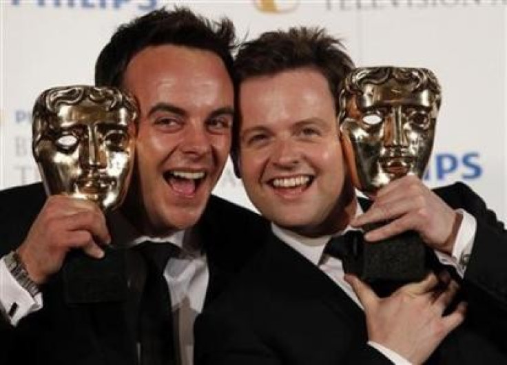 Ant and Dec hold their Bafta awards (Photo: Reuters)