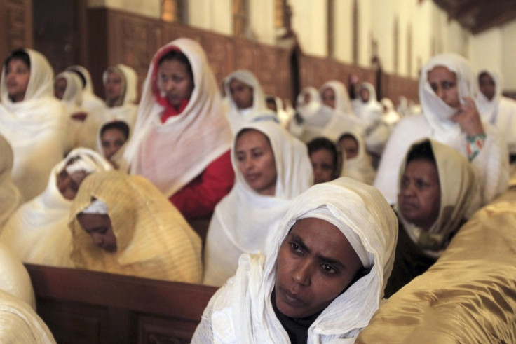 Coptic Christians celebrate mass at St Mark's Cathedral in Cairo