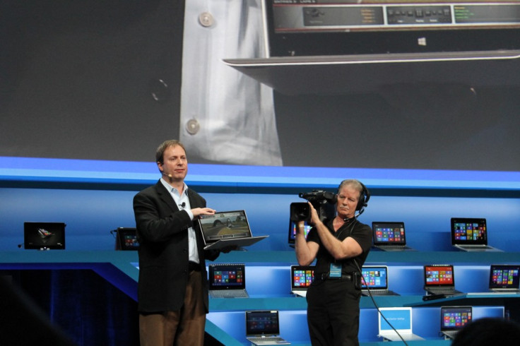 Intel vice president Kirk Skaugen showing off its reference Ultrabook for its fourth generation of Core processors.