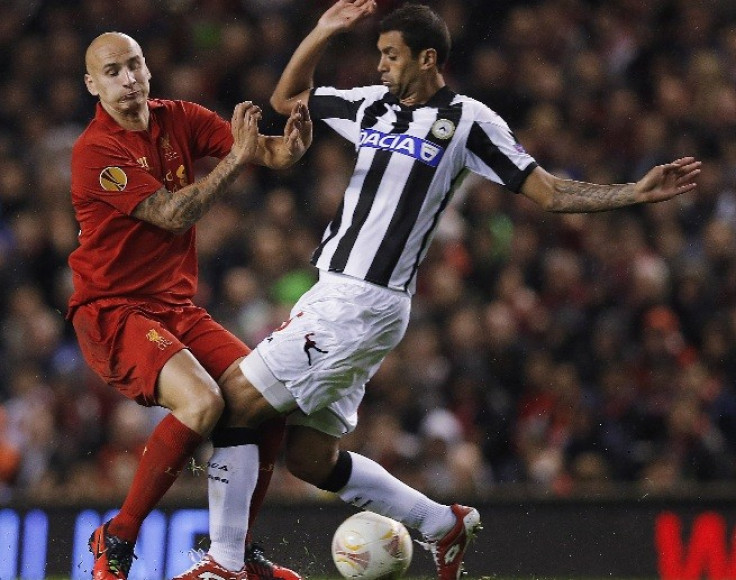 Danilo clatters Liverpool's Shelvey during Europa Cup tie