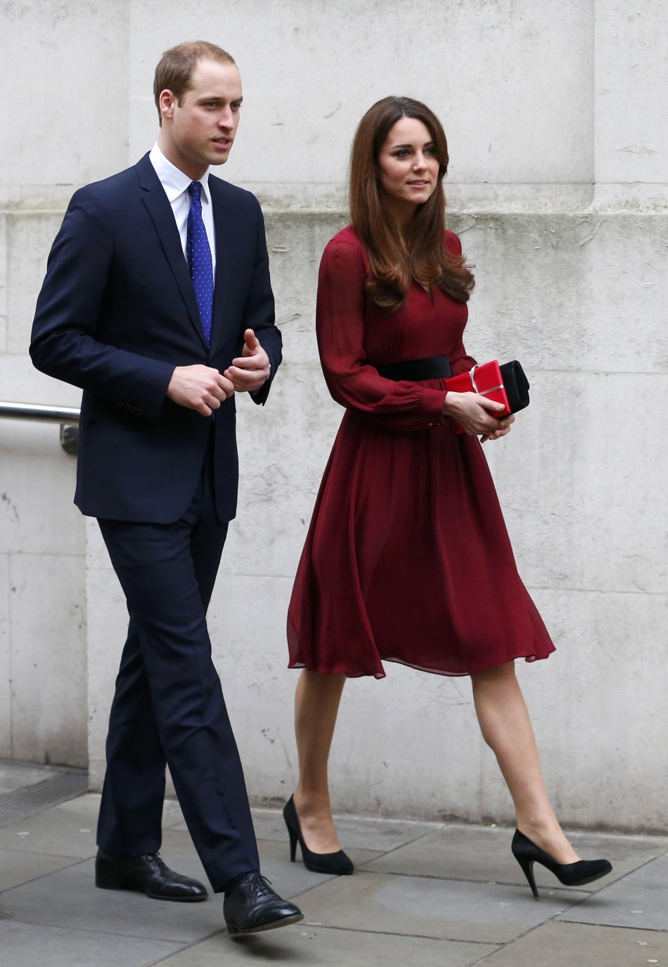 Catherine, Duchess of Cambridge, leaves the National Portrait Gallery with her husband, Prince William