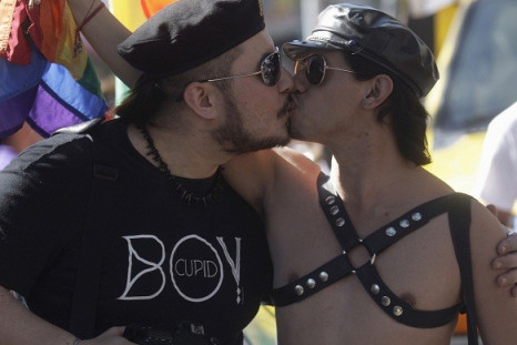 Two men embrace