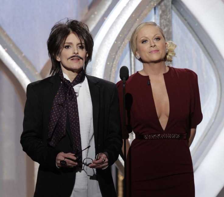 Hosts Tina Fey (L) and Amy Poehler on stage at the 70th annual Golden Globe Awards in Beverly Hills