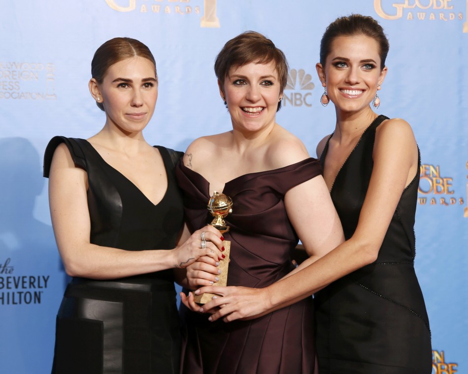 Girls creator and actress Dunham with cast members Williams and Mamet after Girls won award for Best Televison Series, Comedy or Musical at 70th annual Golden Globe Awards in Beverly Hills