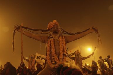 Naga sadhus or Hindu holymen arrive to attend the first 'Shahi Snan' at the ongoing "Kumbh Mela", or Pitcher Festival, in Allahabad