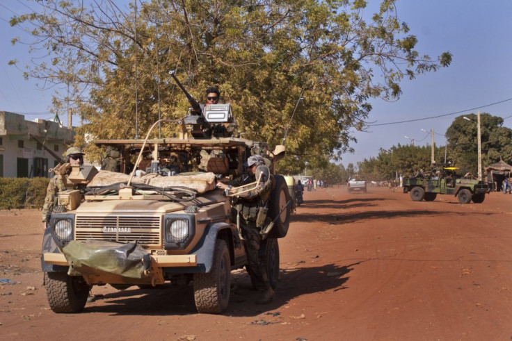 French Elite Special Operations soldiers drive through the town of Markala