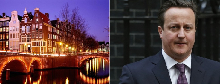 Amsterdam under lights (l) Cameron poised for keynote speech
