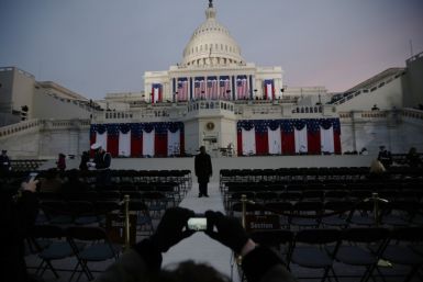 Guests at the Inauguration of the U.S. President Barack Obama take pictures before sunrise at the U.S. Capitol
