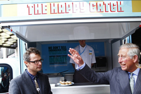 Britain's Prince Charles speaks to the creative director of Selfridges Alannah Weston and chef Hugh Fearnley-Whittingstall at Selfridges department store in London