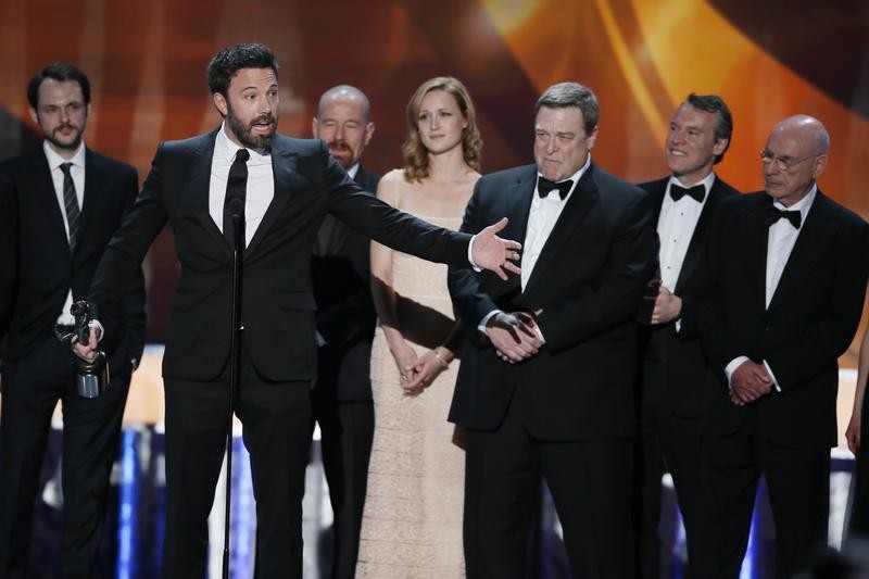 Ben Affleck 2nd from L accepts the award for outstanding cast in a motion picture for Argo at the 19th annual Screen Actors Guild Awards in Los Angeles, California