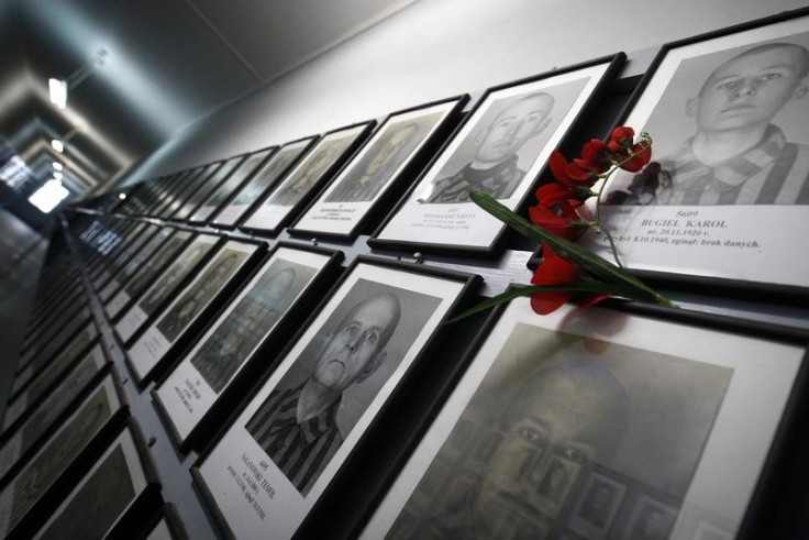 Pictures of former prisoners hang on a wall at one of the barracks at the Auschwitz concentration camp January 27, 2013. A ceremony to mark the 68th anniversary of the liberation of Auschwitz by Soviet troops and to remember the victims of the Holocaust w