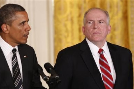 White House counterterrorism advisor John Brennan (R) listens as U.S. President Barack Obama nominates him to become the next CIA director at the White House in Washington January 7, 2013.