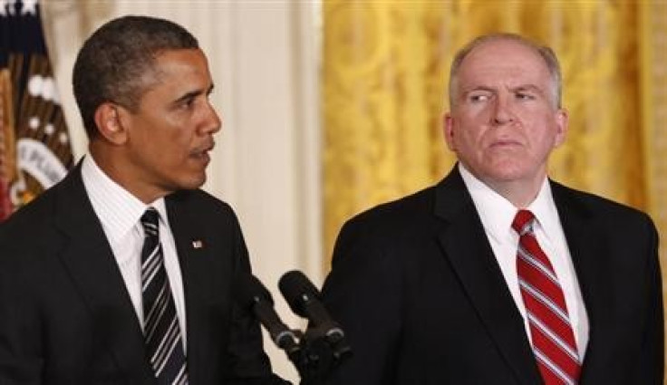 White House counterterrorism advisor John Brennan (R) listens as U.S. President Barack Obama nominates him to become the next CIA director at the White House in Washington January 7, 2013.