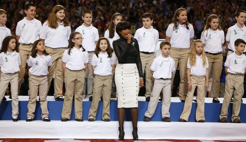 Singer Jennifer Hudson performs America the Beautiful with The Sandy Hook Elementary School Choir, from Newtown, Connecticut, prior to the NFL Super Bowl XLVII football game between the San Francisco 49ers and Baltimore Ravens in New Orleans,