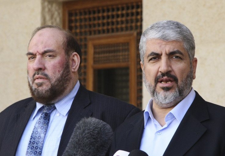 Hamas leader Khaled Meshaal (R) and Mohammad Nazzal, a member of the Hamas leadership
