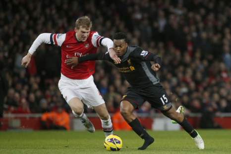Daniel Sturridge battles Arsenal's Per Mertesacker