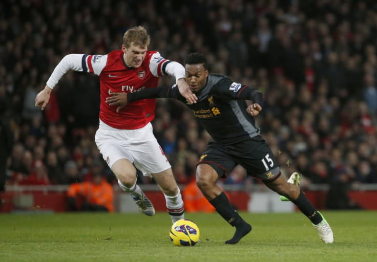 Daniel Sturridge battles Arsenal's Per Mertesacker