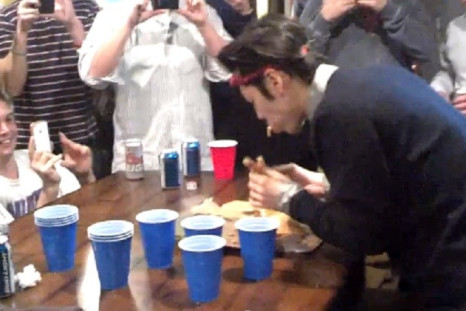 Takeru Kobayashi feasts on pizza