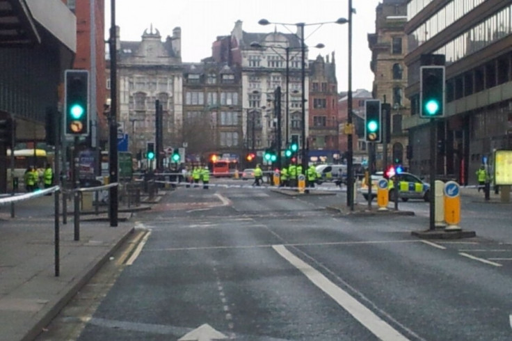 Police on Portland Street, Manchester city centre. (Twitter/@baldkojak)