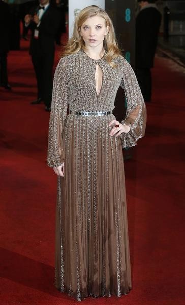 Natalie Dormer poses as she arrives for the British Academy of Film and Arts BAFTA awards ceremony at the Royal Opera House in London February 10, 2013.
