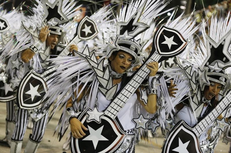 Revellers of Mocidade Independente samba school participate on the first night of the annual Carnival parade in Rio de Janeiros Sambadrome, February 11, 2013.