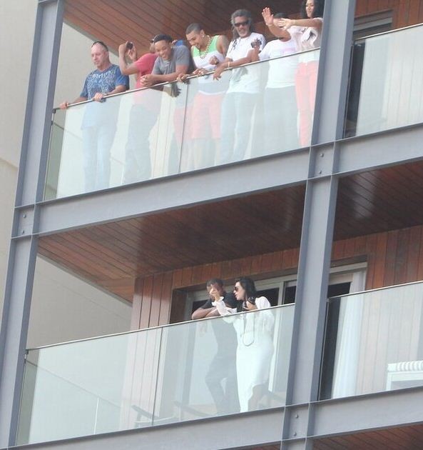 Kanye West, Kim Kardashian and  Will Smith on the Balcony of the hotel in Ipanema